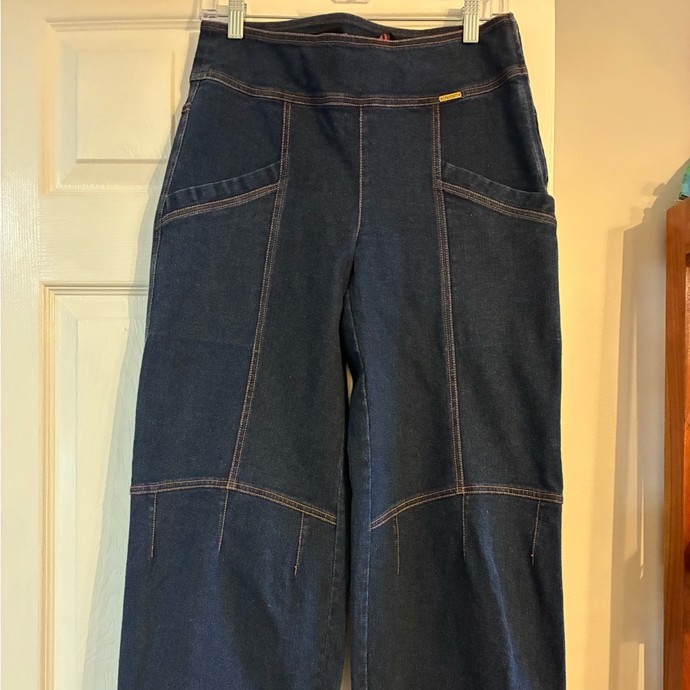 Blue denim barrel jean in a medium wash